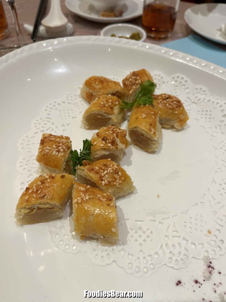 Steamed 'Nian Gao' with Shredded Coconut accompanied with Baked Lotus Pastries with Sesame